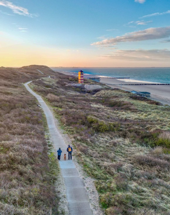 A dune path at sunset near Dishoek