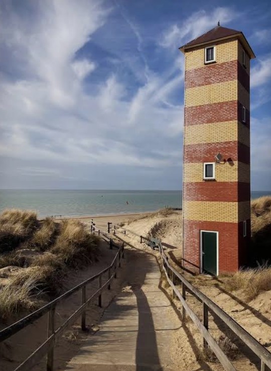 The Kaapduinen lighthouse among the dunes